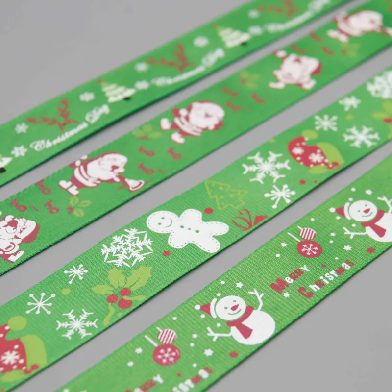 Cinta de grosgrain estampada con Papá Noel, muñeco de nieve y reno para envolver regalos, vista de detalle del producto 8