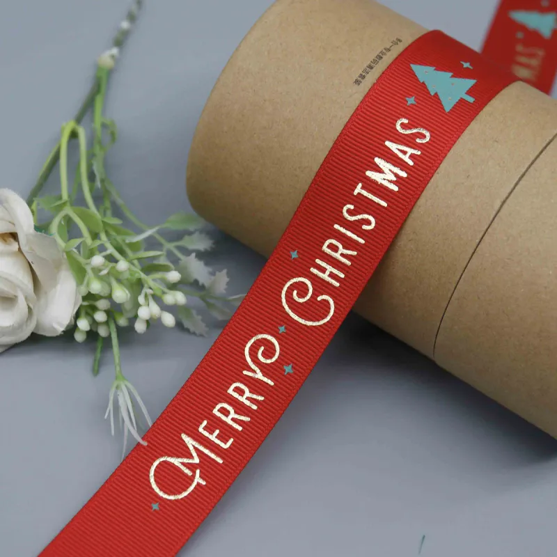 Cinta de grosgrain navideña con Papá Noel y lámina dorada para envolver regalos, vista de detalle del producto 2
