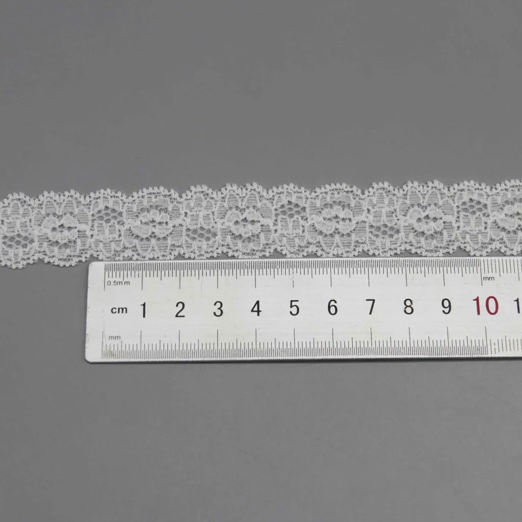 Symmetrische beidseitig gebogte elastische Spitze für Dessousträger und Bastelarbeiten — Detailansicht 3 Symmetrische beidseitig gebogte elastische Spitze für Dessousträger und Bastelarbeiten — Detailansicht 3
