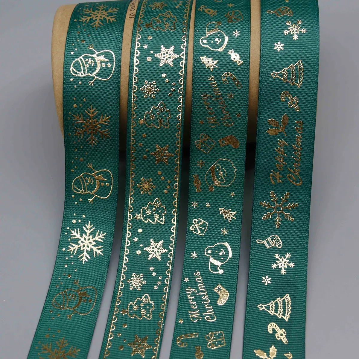 Cinta de grosgrain festiva con estampado metálico para manualidades navideñas, vista principal del producto