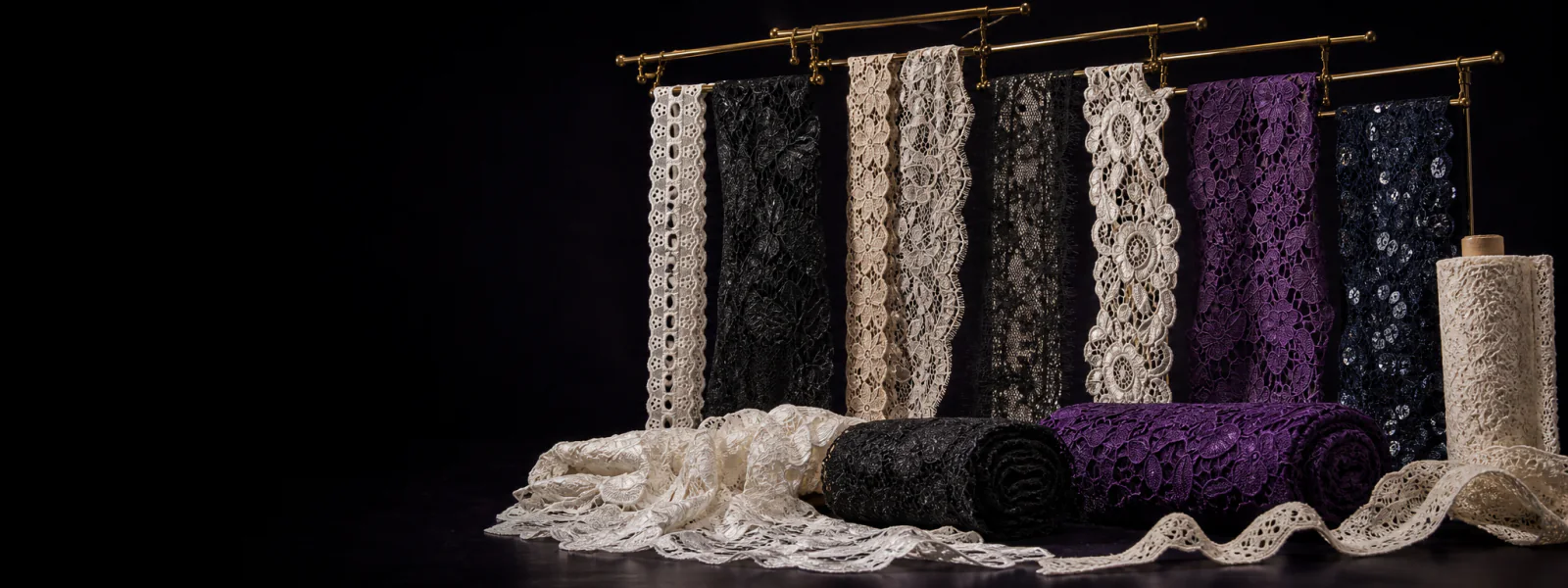 Cotton eyelet, stretch, polyester, embroidered, guipure and eyelash lace samples in ivory, black, plum and navy