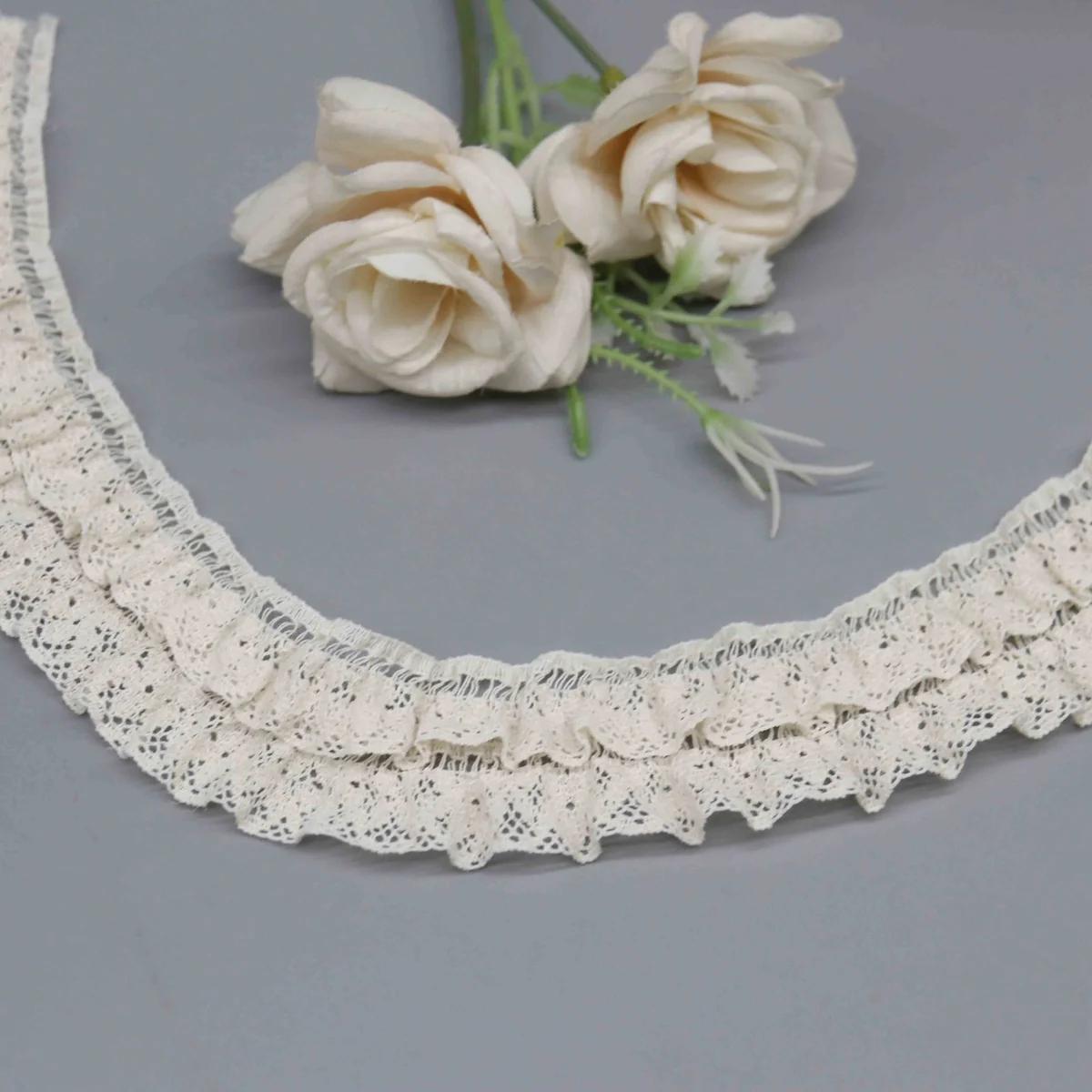 A Fine Mesh Or Pointelle Lace Gathered Stitched Ruffled Lace Trim for Garment Trim
