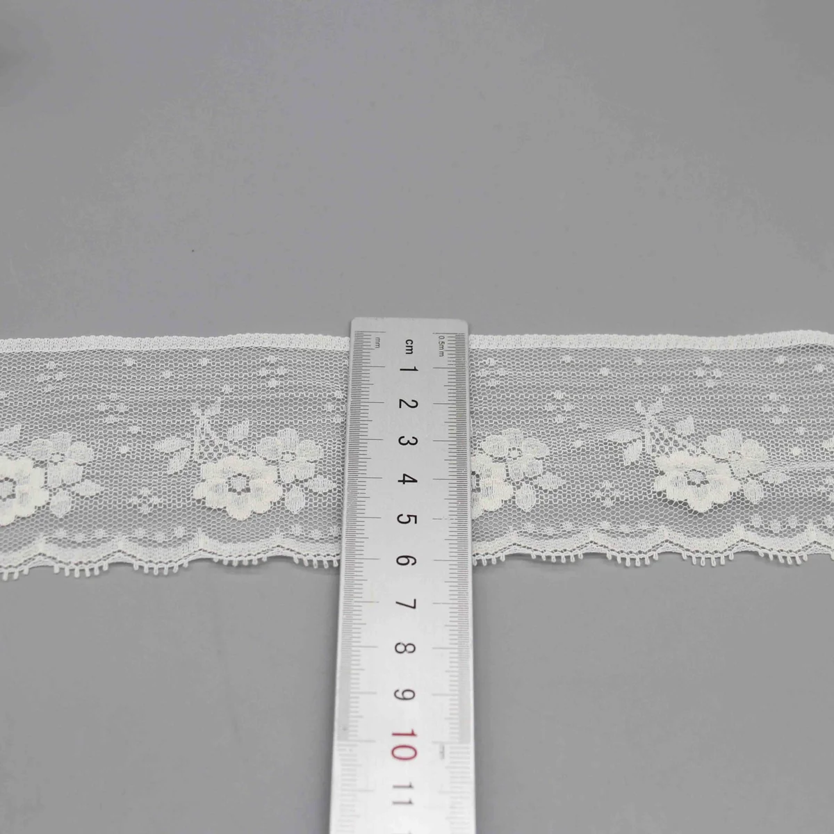 Floral Motifs On A Mesh Ground. One Design Lace Trim for Lingerie