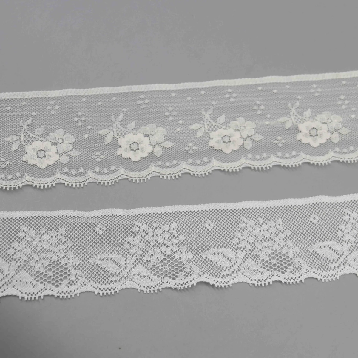 Floral Motifs On A Mesh Ground. One Design Lace Trim for Lingerie