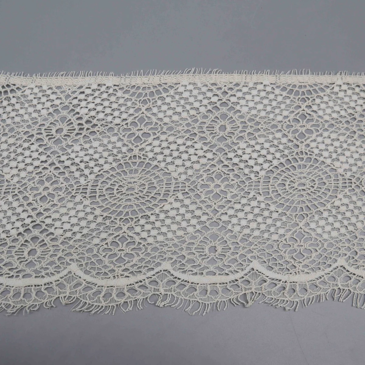 Geometric Circular Medallions Arranged In A Wide Cotton Lace Trim for Apparel Hemming