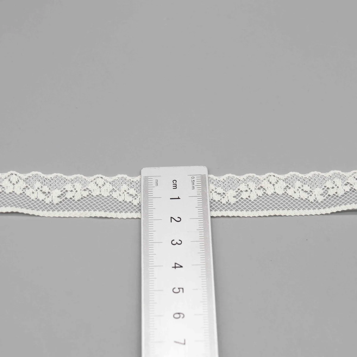 Small Repeating Floral Vine On A Mesh Ground Lace Trim for Lingerie