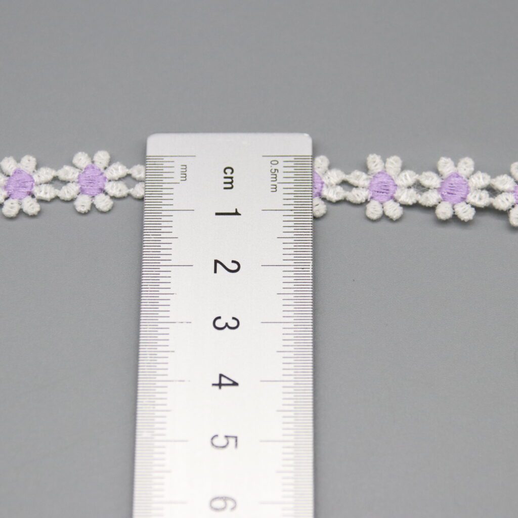 Detailed view of charming water-soluble crochet lace trim