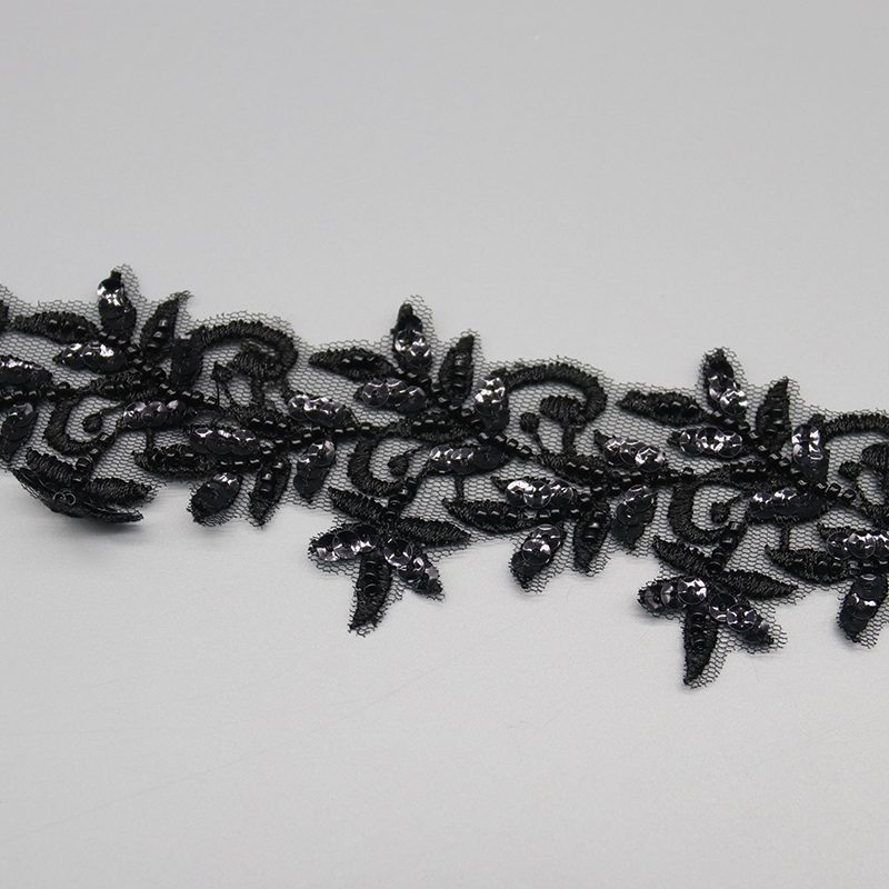 Exquisite beaded embroidered lace trim suitable for decorating curtains, tablecloths, and a variety of fashion items.