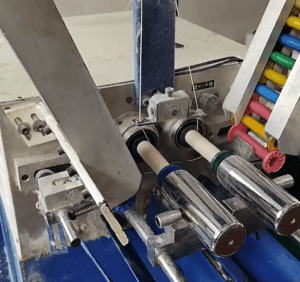 Inside a contemporary cotton lace factory showcasing automated machines producing high-quality lace trims for garment and home decor industries.