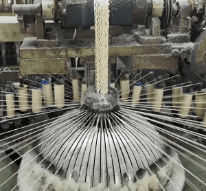 View of a large-scale cotton lace production facility combining skilled craftsmanship and advanced manufacturing equipment for bulk lace orders.