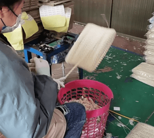 A cotton lace fabric factory equipped with precision machinery and offering custom design options, dedicated to producing fine lace for various applications.