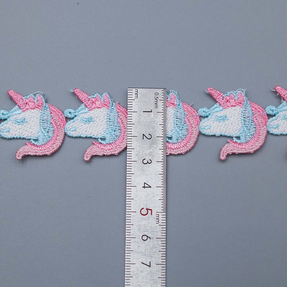 Side‑by‑side comparison of vivid color lace florals and clean white base trims designed to be dyed on demand for seasonal collections.