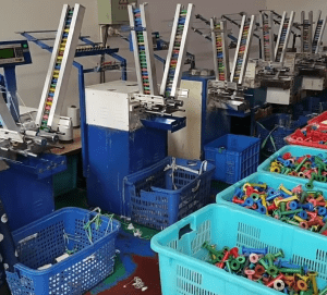 Innovative workshop specializing in cotton thread lace production, featuring advanced textile machinery and quality control processes.