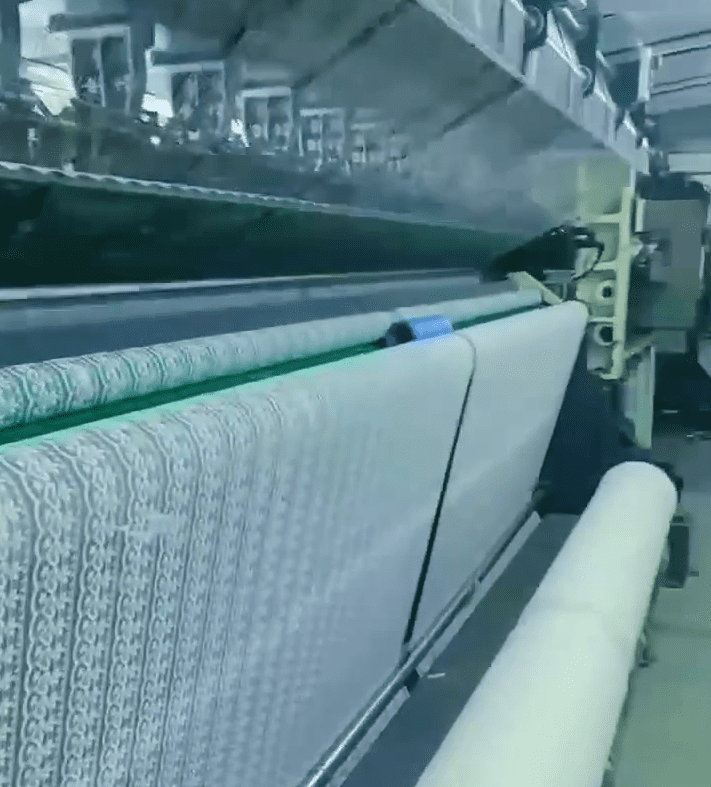 Modern lace factory using energy‑saving equipment and streamlined finishing/packing lines to deliver soft, ready‑to‑ship lace trims for global markets.