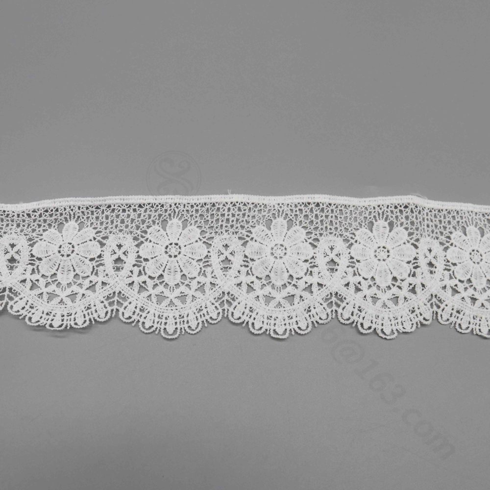 Close-up of new stock water-soluble milk silk polyester lace trim