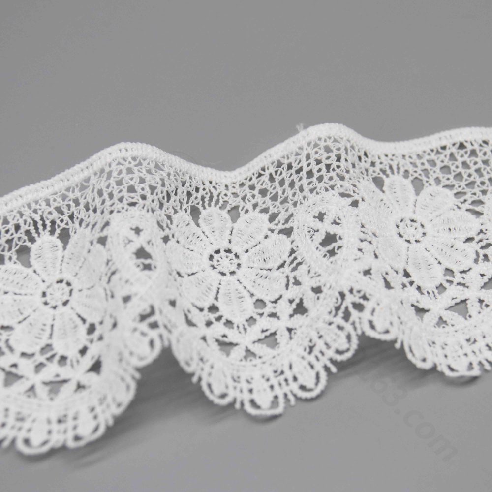 High-resolution image of fresh stock snow white polyester lace trim