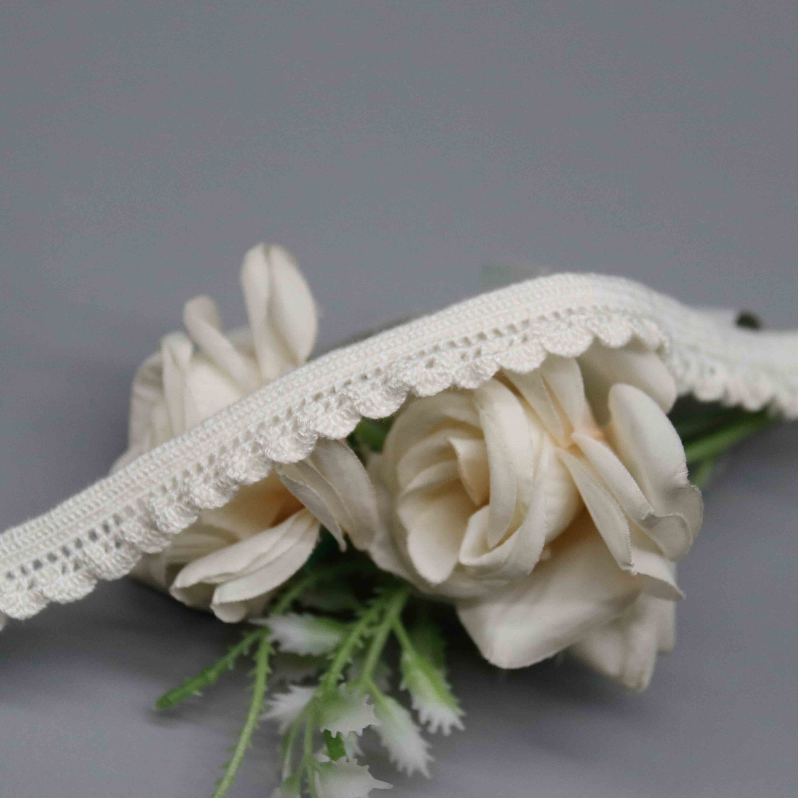High-resolution focus on the uniform fan-shaped curves and decorative hemline quality.