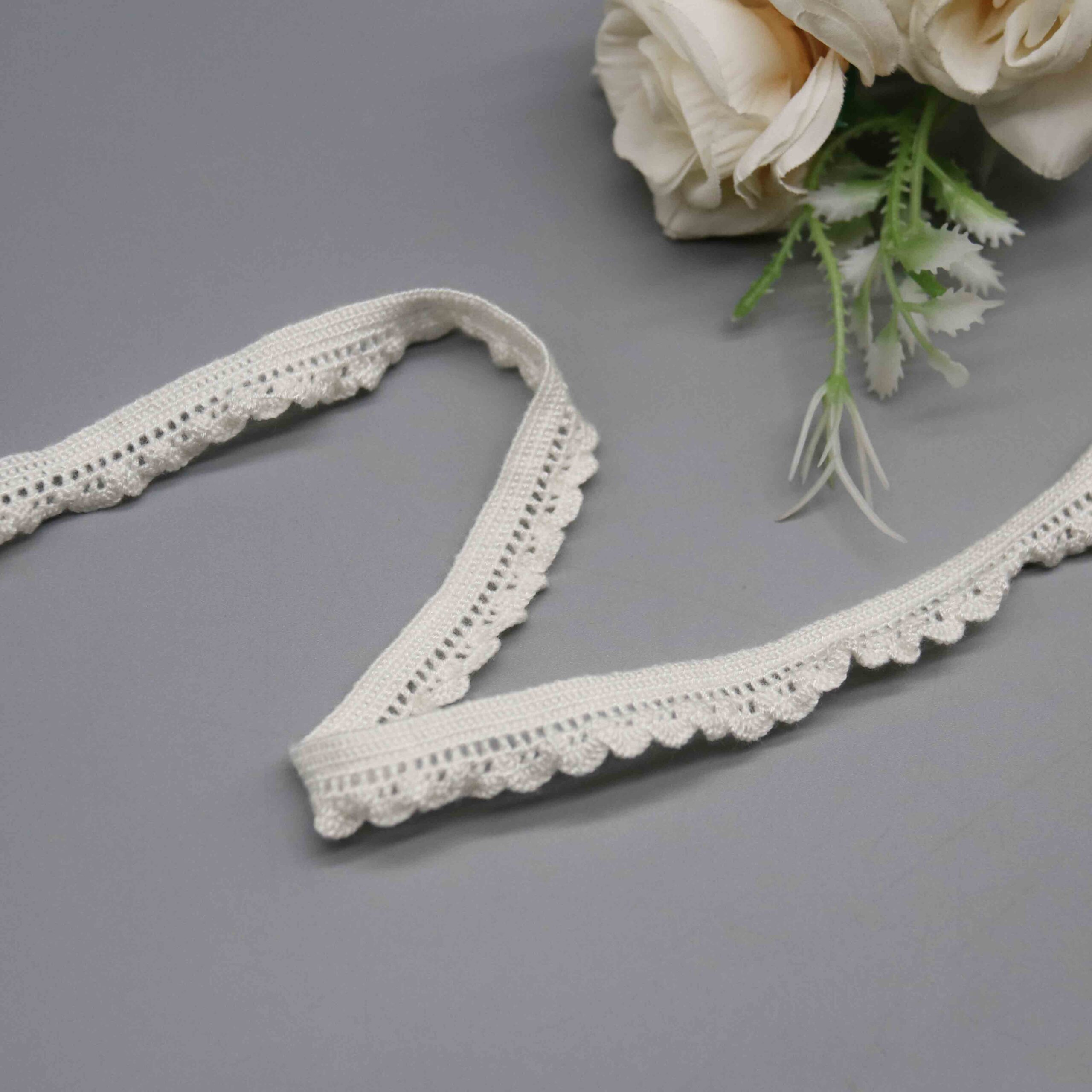 Angled view highlighting the soft sheen finish and stretchy tactile sensation of the fabric.