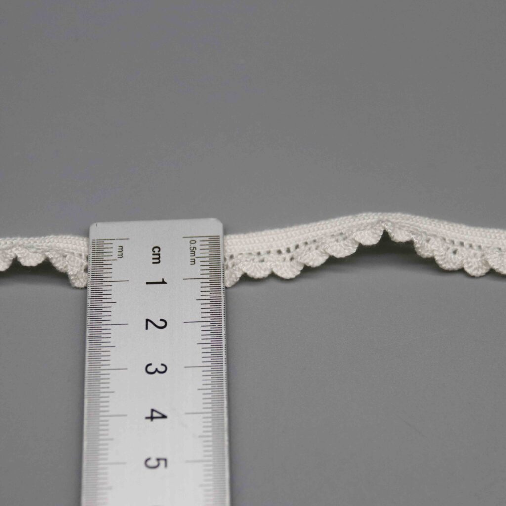 Vertical sizing gauge displaying the exact 1.2cm dimension of the decorative ribbon
