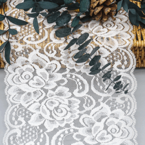 Close-up of factory-wholesale 16cm wide luxury lace trim featuring intricate mesh craft with expansive 3D floral motifs in layered detail, finished with graceful wave-shaped lockstitching edges; soft and romantic, perfect for enhancing lingerie sophistication.