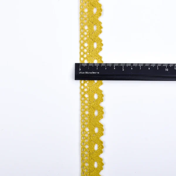 High quality soft crochet lace trim in vintage cotton featuring eyelet ribbon pattern, ideal for clothing decoration.