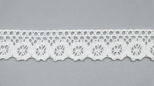 Soft cotton flower crochet lace trim available in customizable widths, wholesale from factory, perfect for fashion garment embellishment.