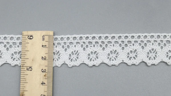 Durable and soft 100% cotton flower lace crochet trim offered wholesale with custom width options, ideal for fashion clothing.