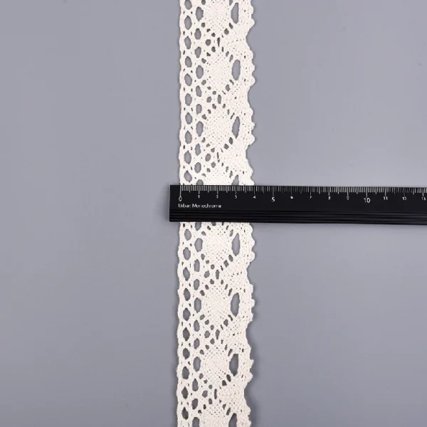 Elegant cotton flower crochet lace trim supplied at factory wholesale price, featuring customizable width for decorating clothes.