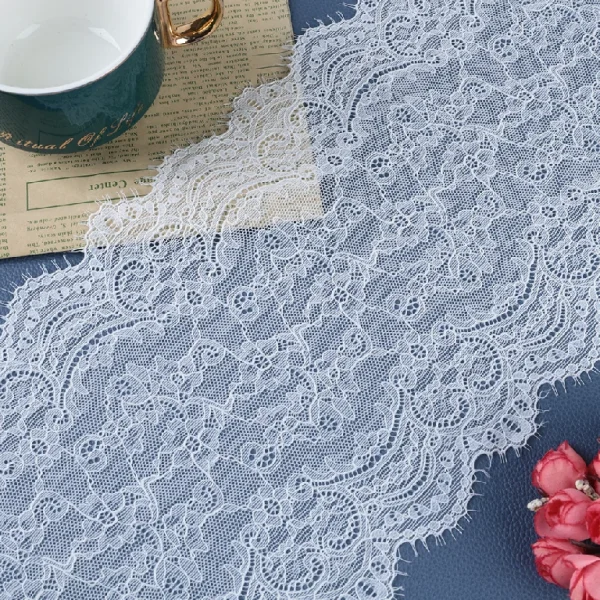 Premium quality mesh lace trim offering stretch and elasticity, made with 90% nylon and 10% spandex for bridal dress decoration.