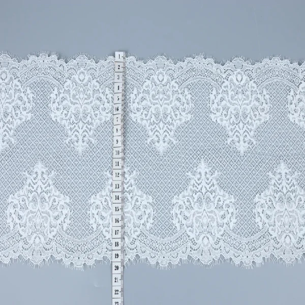 Premium quality eyelash French lace with 90% nylon and 10% spandex stretch, latest lace trim design for upscale clothing.