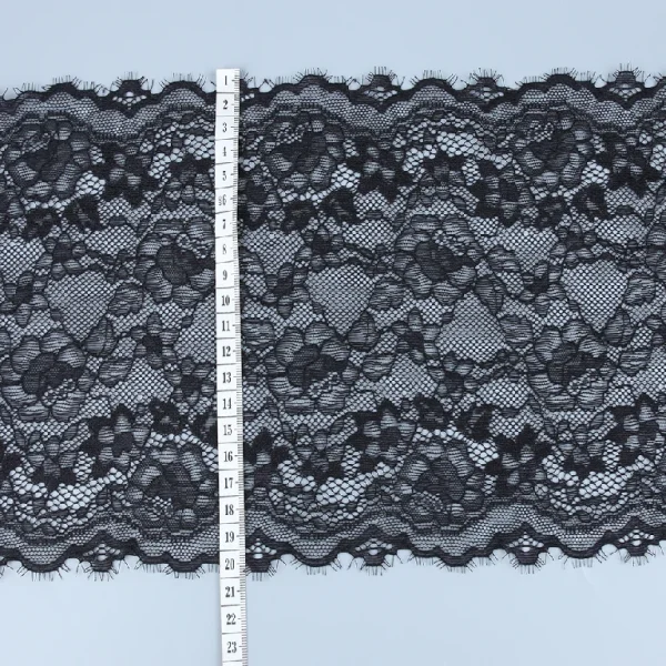Black eyelash lace trim with intricate floral and wave patterns, measuring approximately 21 cm wide, featuring delicate eyelash edges ideal for lingerie and garment decoration.