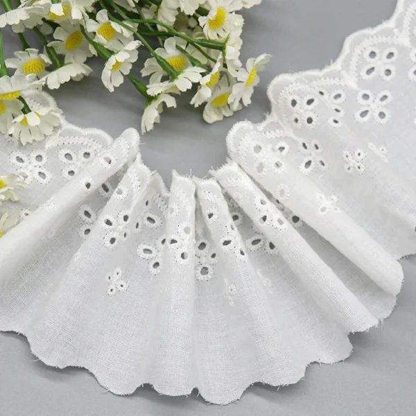 Trending pure cotton embroidered flower eyelet lace trim, highly suitable for adding elegant touches to high-quality garments.