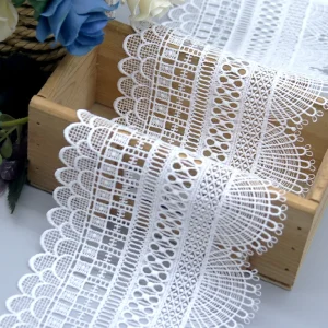 Water soluble lace embroidery trimming in white, bringing luxury and elegance to garment crafting