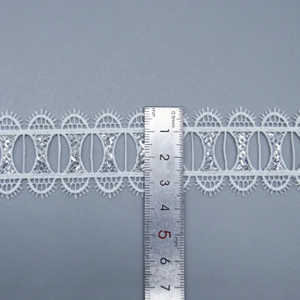 Decorative 100% Polyester Water Soluble Flower Eyelet Lace for Clothing and Textile Projects.