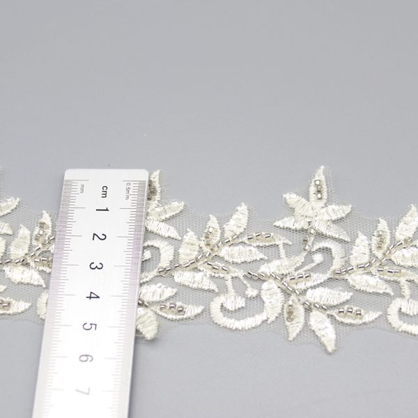 Creative and elegant handmade beaded embroidery lace, ideal for DIY projects like decorating clothes and bags.