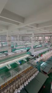 State-of-the-art water soluble lace factory equipped with advanced technology and skilled workers, specializing in custom lace design and bulk production.