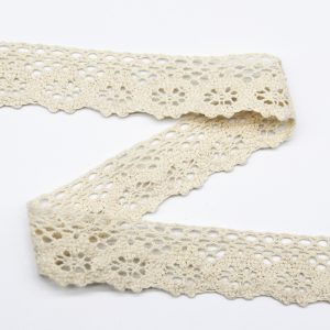 Lightweight cotton thread lace trim adorned with intricate floral designs, perfect for enhancing apparel with delicate detailing.