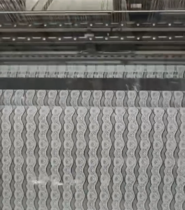 Factory specializing in wholesale lace production offering custom design services and fast turnaround times to meet client demands.