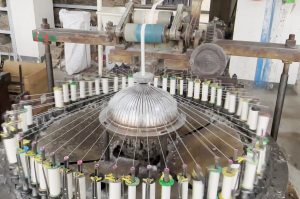 Cotton thread lace factory showing high-speed precision embroidery machines in operation, ensuring quality and consistency in lace making.