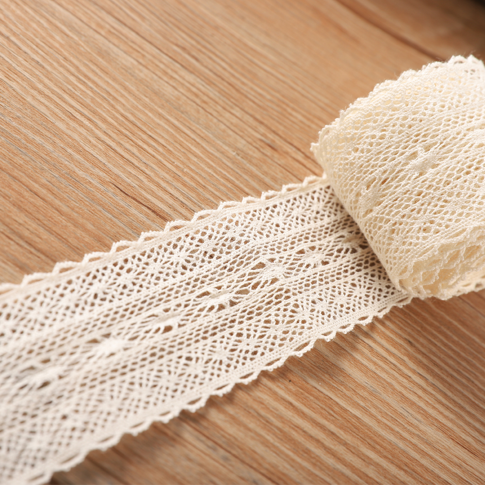 Close-up of elegant beige cotton embroidered lace alongside playful colorful tassel cotton lace trim, highlighting adaptability for curtains, cushions, and bedding designs.