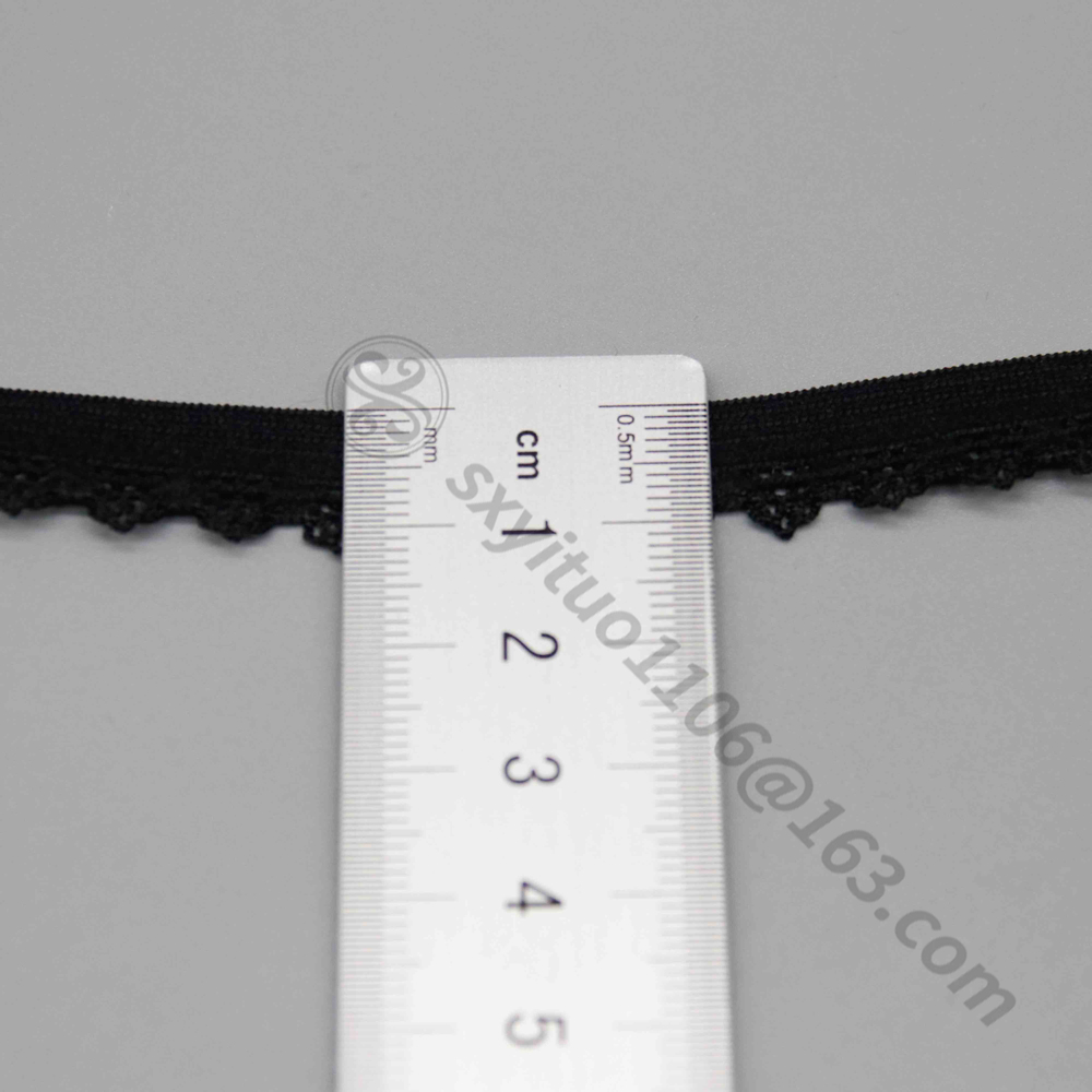 Vibrant image of slim 1.1 cm wide black stretch lace trim