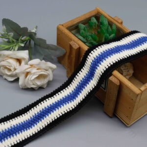 High-resolution image of 4.5 cm color-blocked canvas webbing in black, white, and blue with a dynamic interwoven blue-white middle and fine black lace borders for added depth; thick, practical fabric ideal for pet leashes, garment accents, and creative DIY crafts.