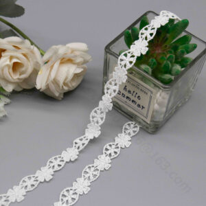 Detailed view of pure white water-soluble embroidered lace trim in a slim strip form, linking stereoscopic six-petal flowers with full, textured embroidery and precise eyelet circular patterns for airy openness; fluid wave edges from seamless connections highlight its embroidery-only structure, perfect for adding delicate romance to bridal dress hems and collars.