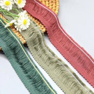 Macro shot of brushed cotton fringe strands showing soft wave texture and natural fiber detail