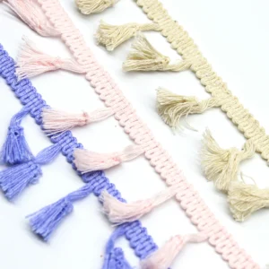 Top-down view of tassel fringe showing even spacing and bundle sweep shape pattern.