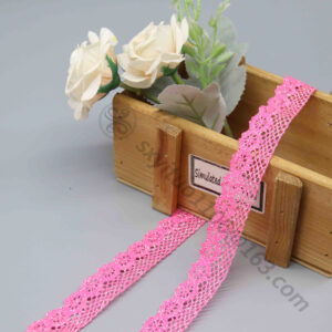 Front-facing shot of Honeycomb Floral Nylon Cotton Crochet Lace Trim in fuchsia pink, showing hexagonal mesh and floral borders clearly.