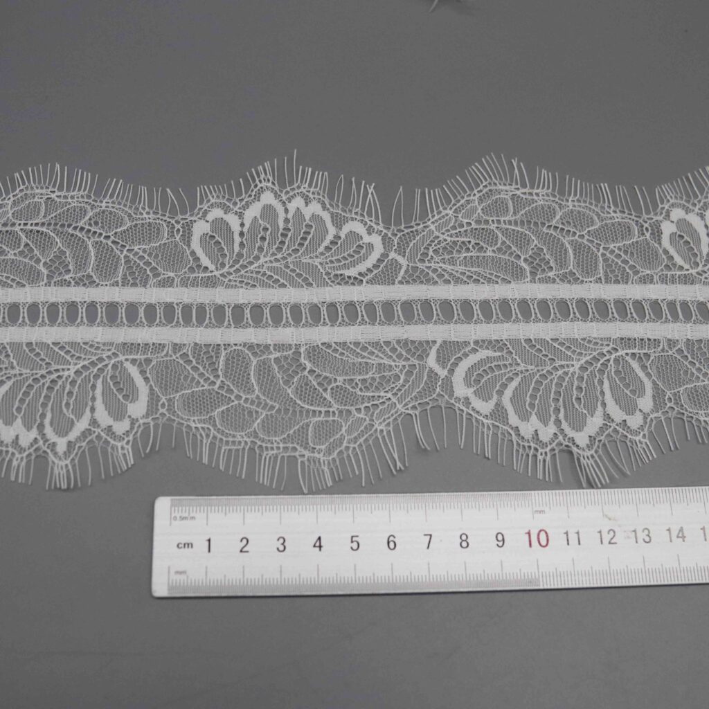 Backlit shot demonstrating the transparency and fine mesh density of the eyelash lace trim