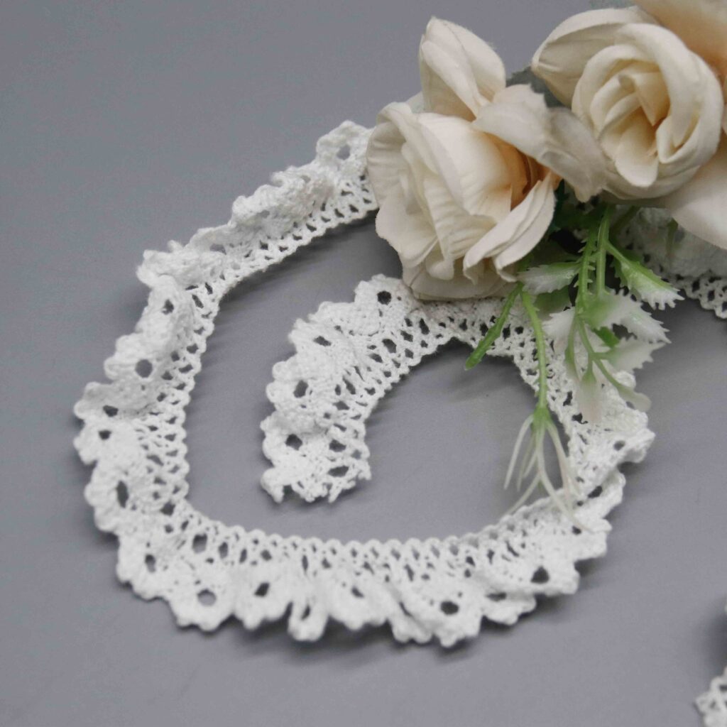 close-up capturing intricate daisy crochet construction and eyelet openwork craftsmanship.