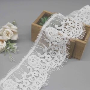 Front-facing shot showing the layered floral clusters and sheer mesh texture clearly.