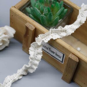 Front-facing shot showing the pre-ruffled crochet lace and flat elastic binding clearly.